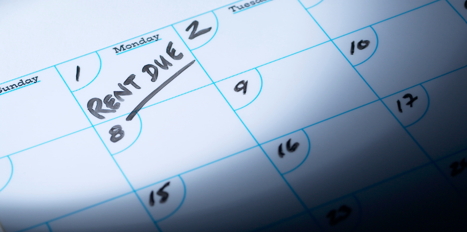 Photo depicts a calendar with the words: Rent Due on the Monday the 1st.