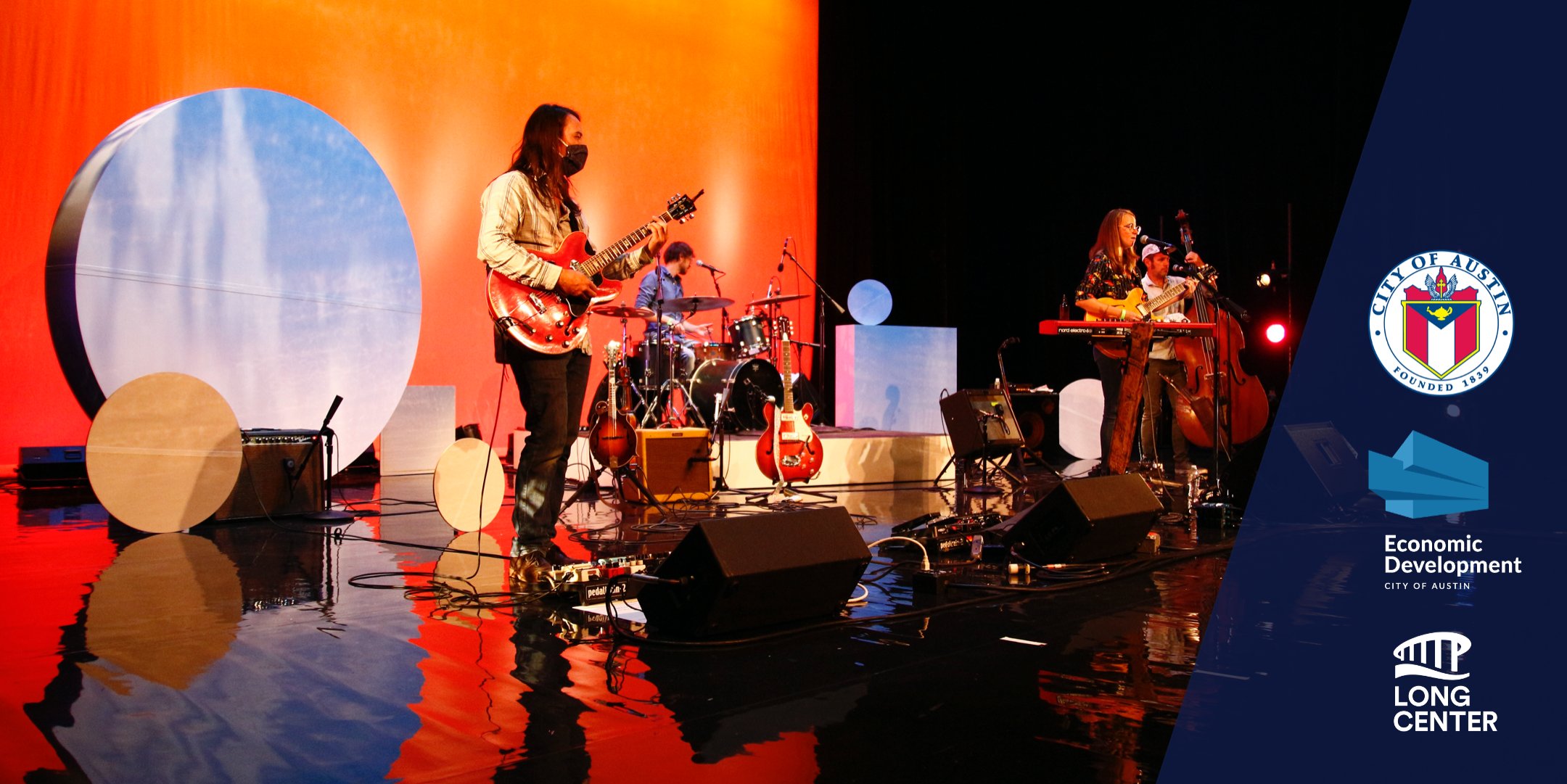 Austin Live Music Venue Preservation Fund Photo of Musicians Playing in a Band on Stage