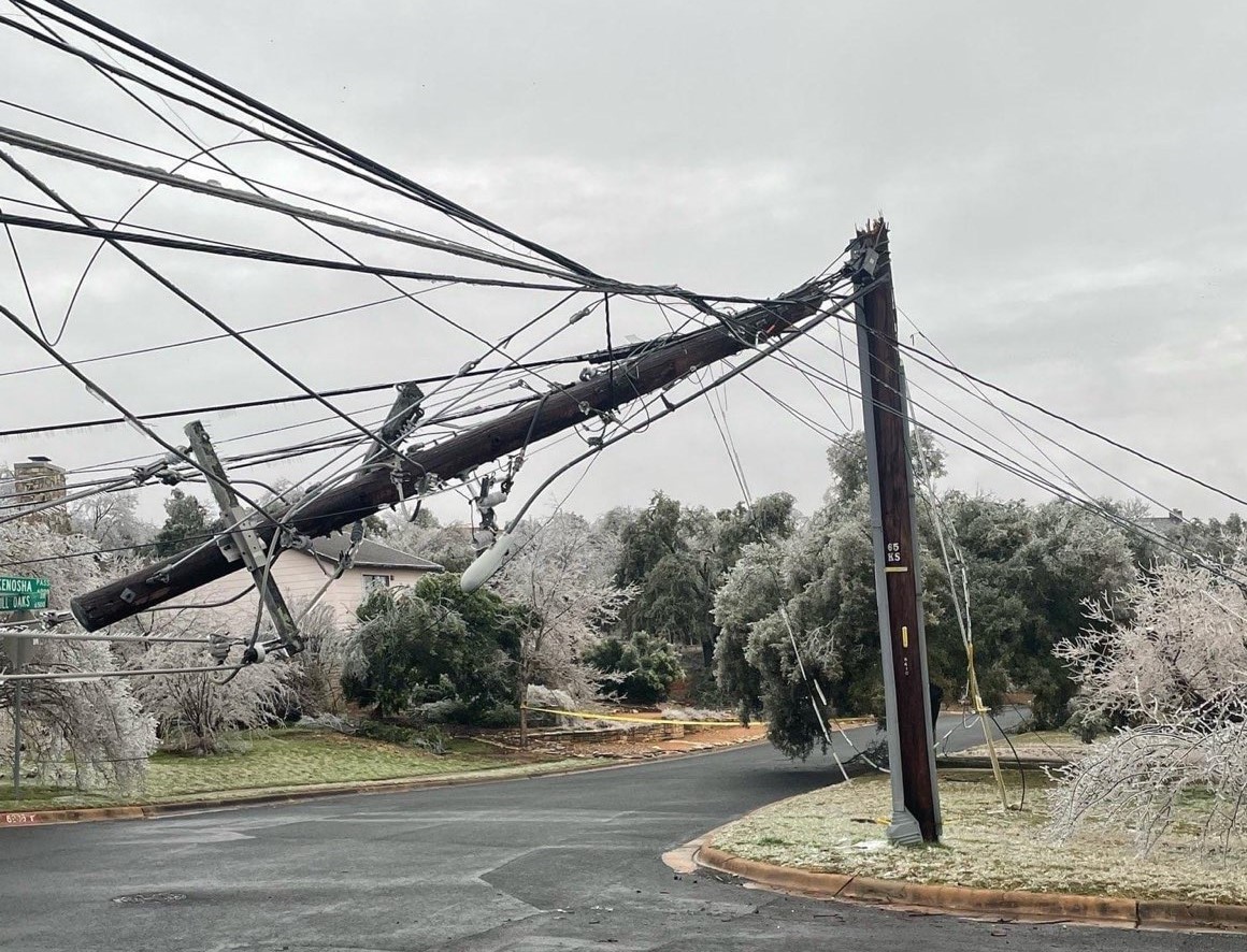 Electric pole covered in ice snapped in two Austin Energy