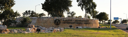 entrance sign to Austin Bergstrom International Airport