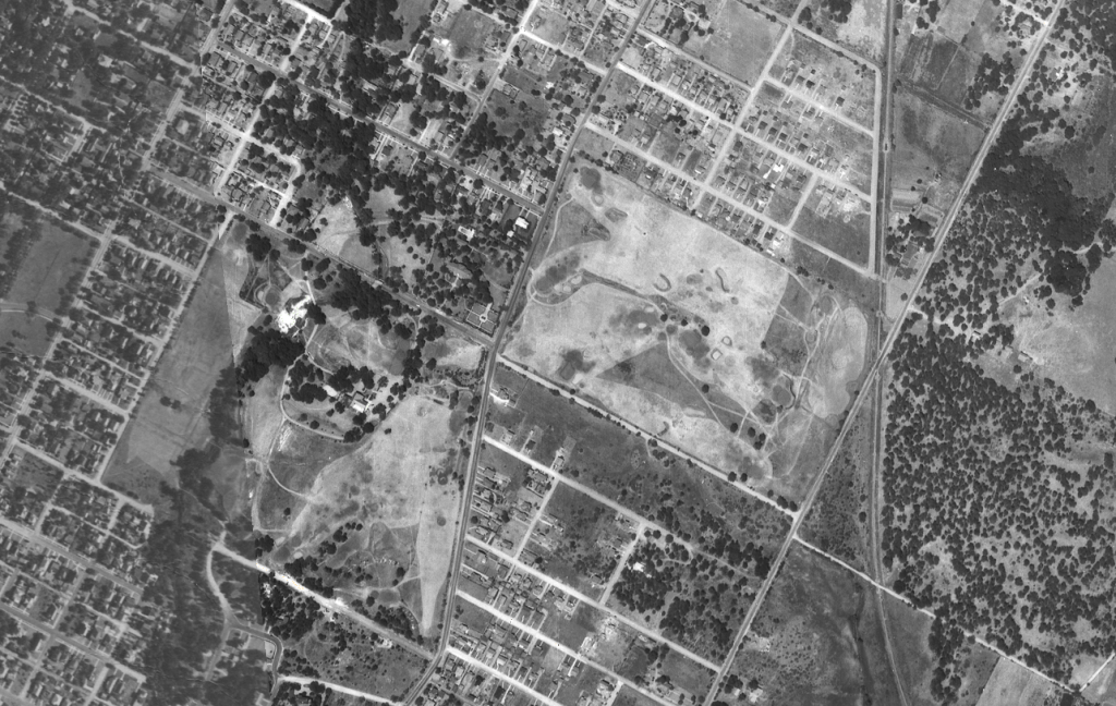 1940 aerial photograph of Austin Country Club   Hancock Golf Course is at the center-left.  At center-right are the original front nine (Holes 1-9), currently the site of Hancock Shopping Center.  