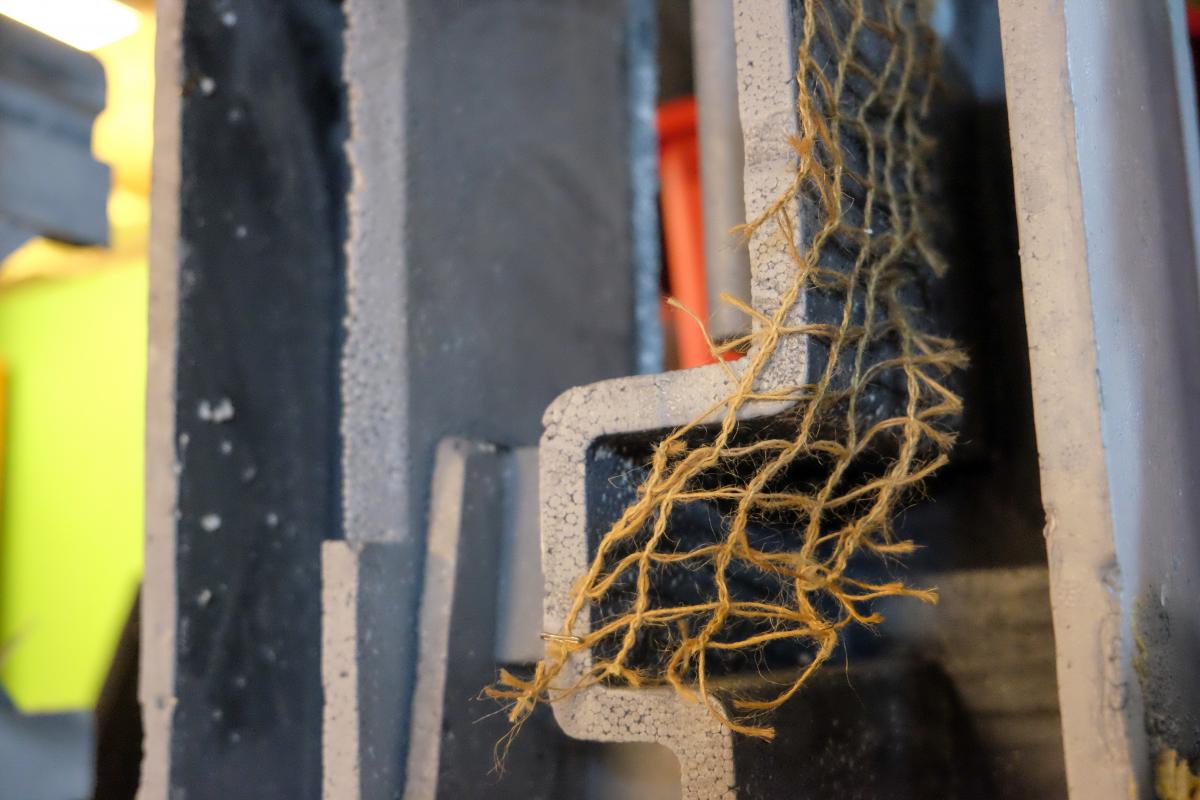 Tiny ladder made of twine.