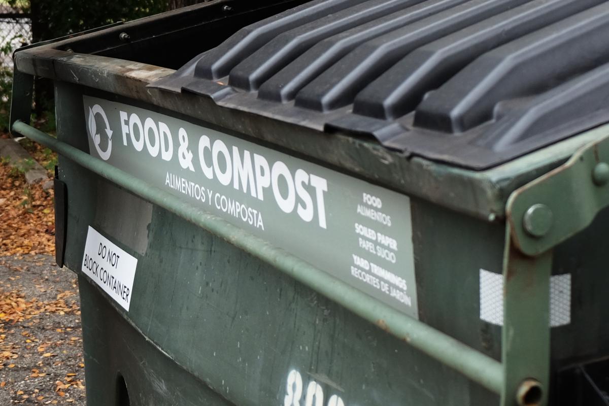 Large compost dumpster labeled "Food & Compost"