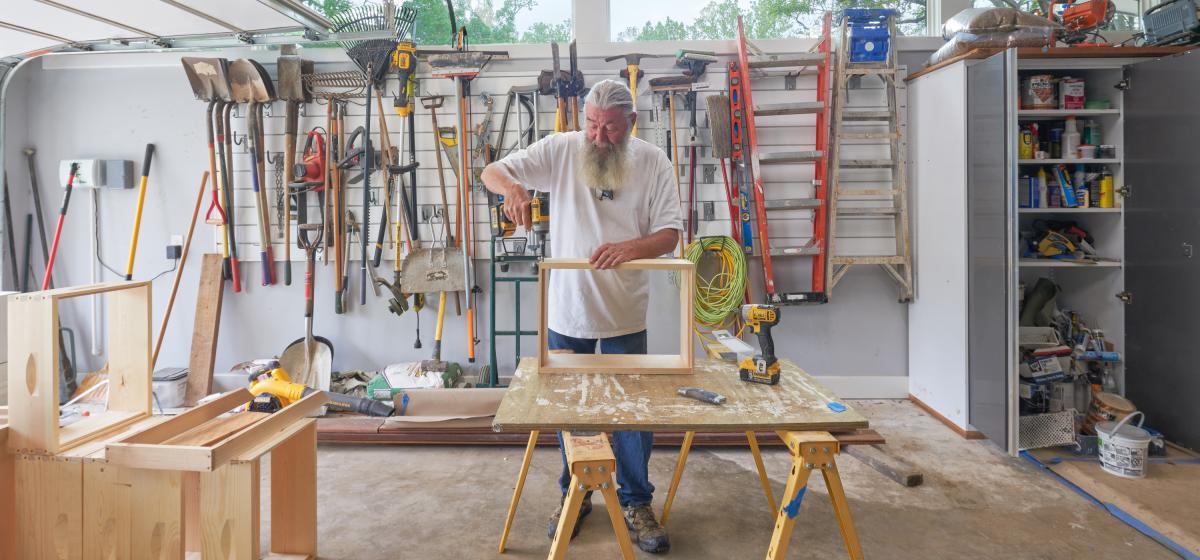 Jerry in his workshop building a frame.