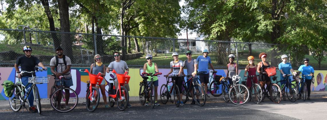 Community members on a group bike ride held by the Smart Trips Program, which educates Austin neighborhoods on their available sustainable mobility options.