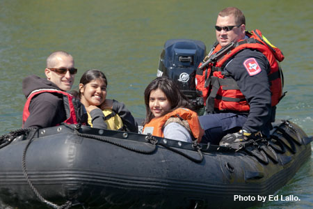 Photo of previous contest winners on boat ride.
