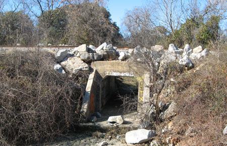 Photo of railroad crossing and culvert at the creek