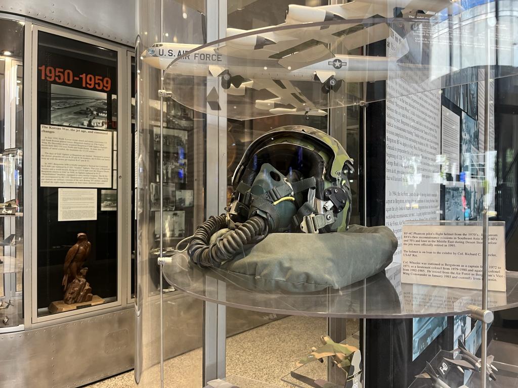 Photo of a fighter mask/helmet from a previous American was in the "History of Bergstrom Air Force Base" installation at AUS.