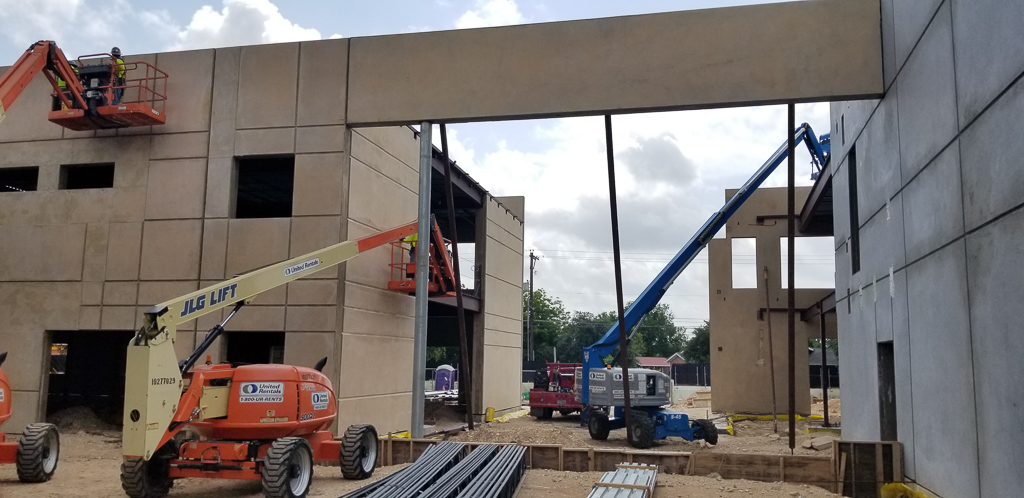 Looking a the entrance lobby from the future parking lot