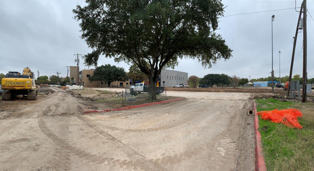The Old Montopolis Recreation Center has been demolished work has started on the new parking lot.