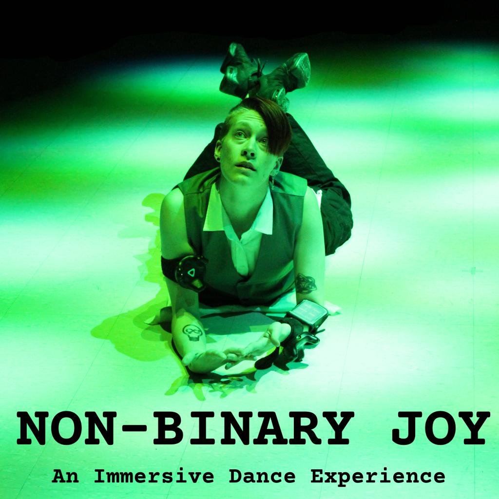 A person laying on their stomach and looking upwards and text 'Non-Binary Joy An Immersive Dance Experience'