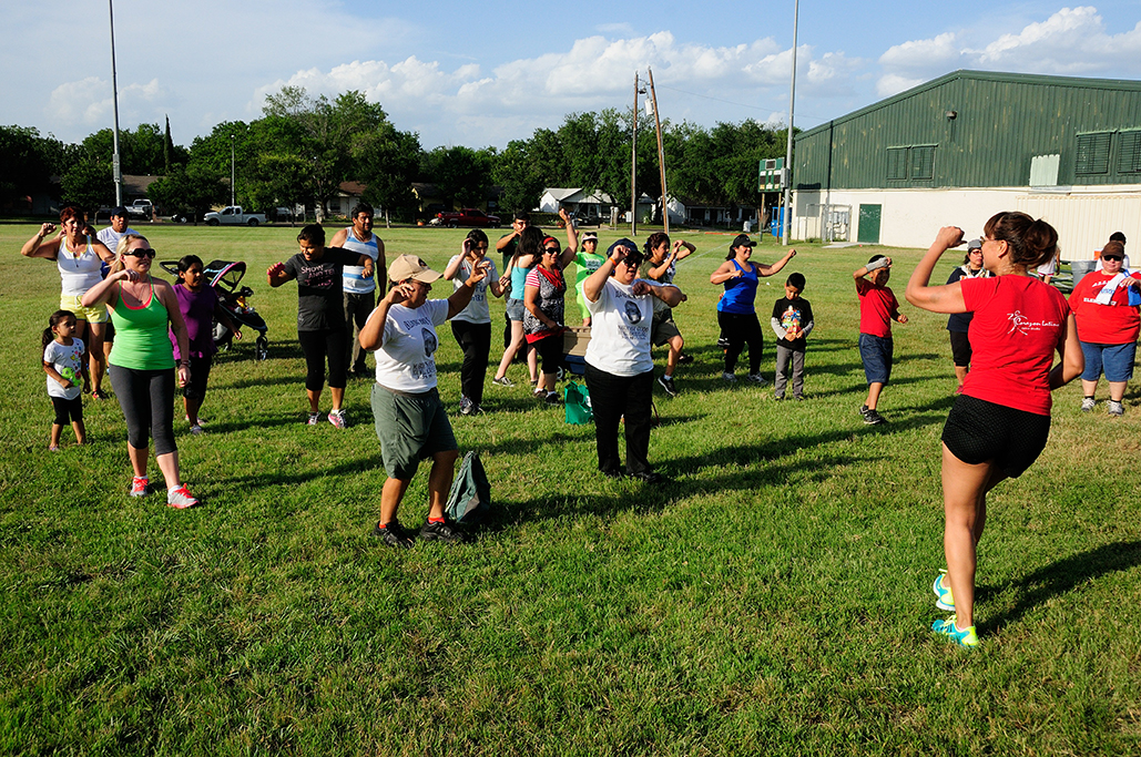 Group exercise outside of Montopolis Recreation Center