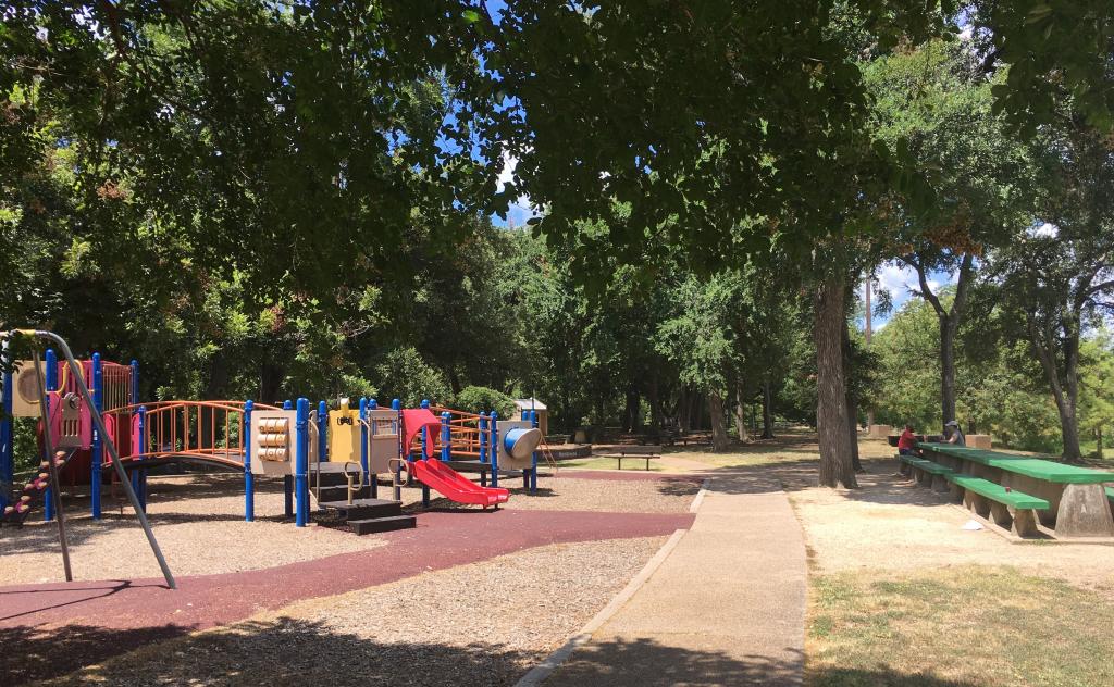 Image of playscape and picnic tables at Beverly S. Sheffield Northwest District Park