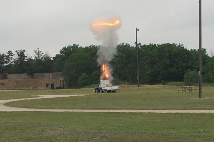 A photo showing a controlled explosion for demonstration purposes.