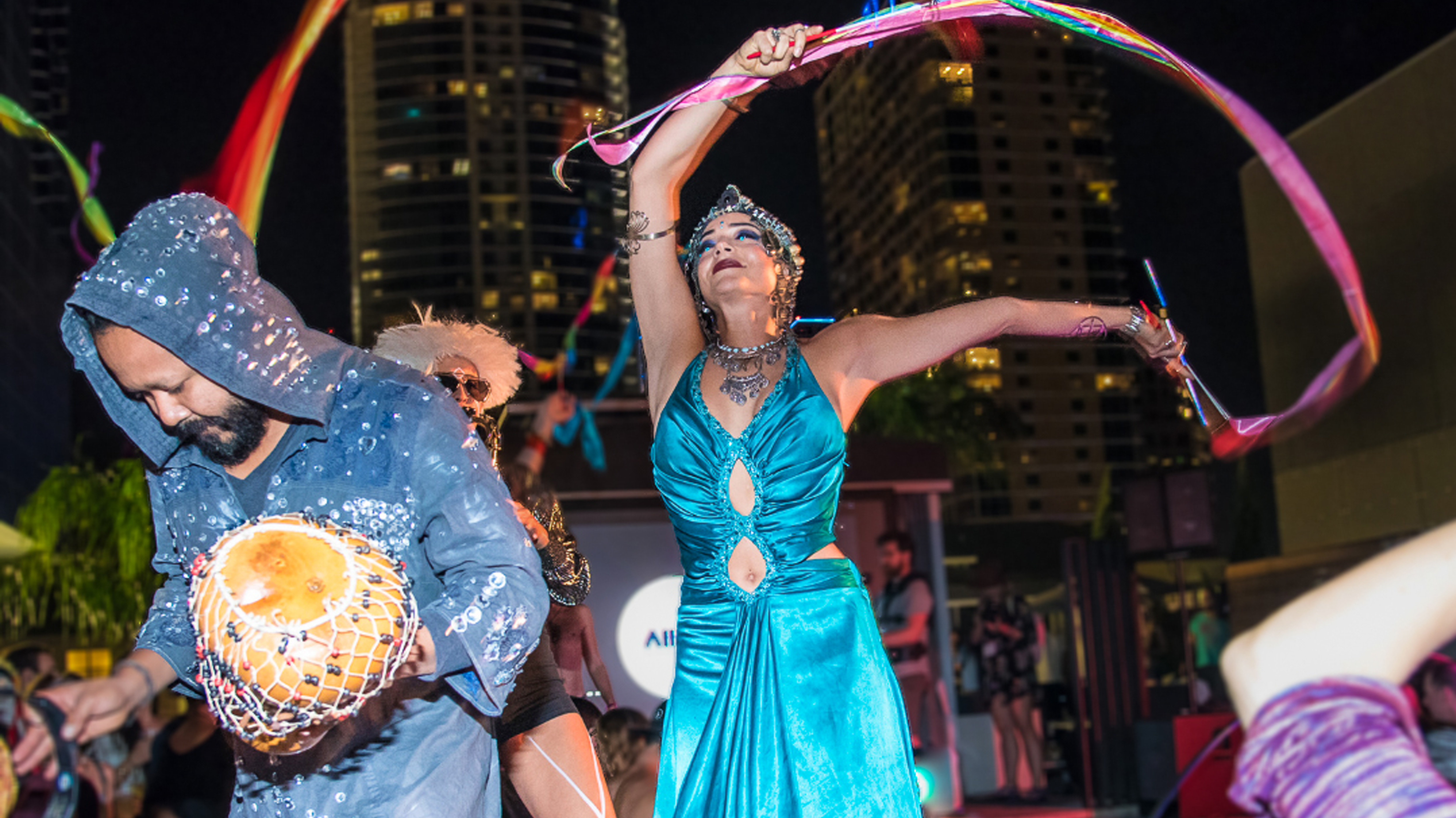 $7 Million in Grants Awarded to Austin Arts Community People dressed in colorful clothing