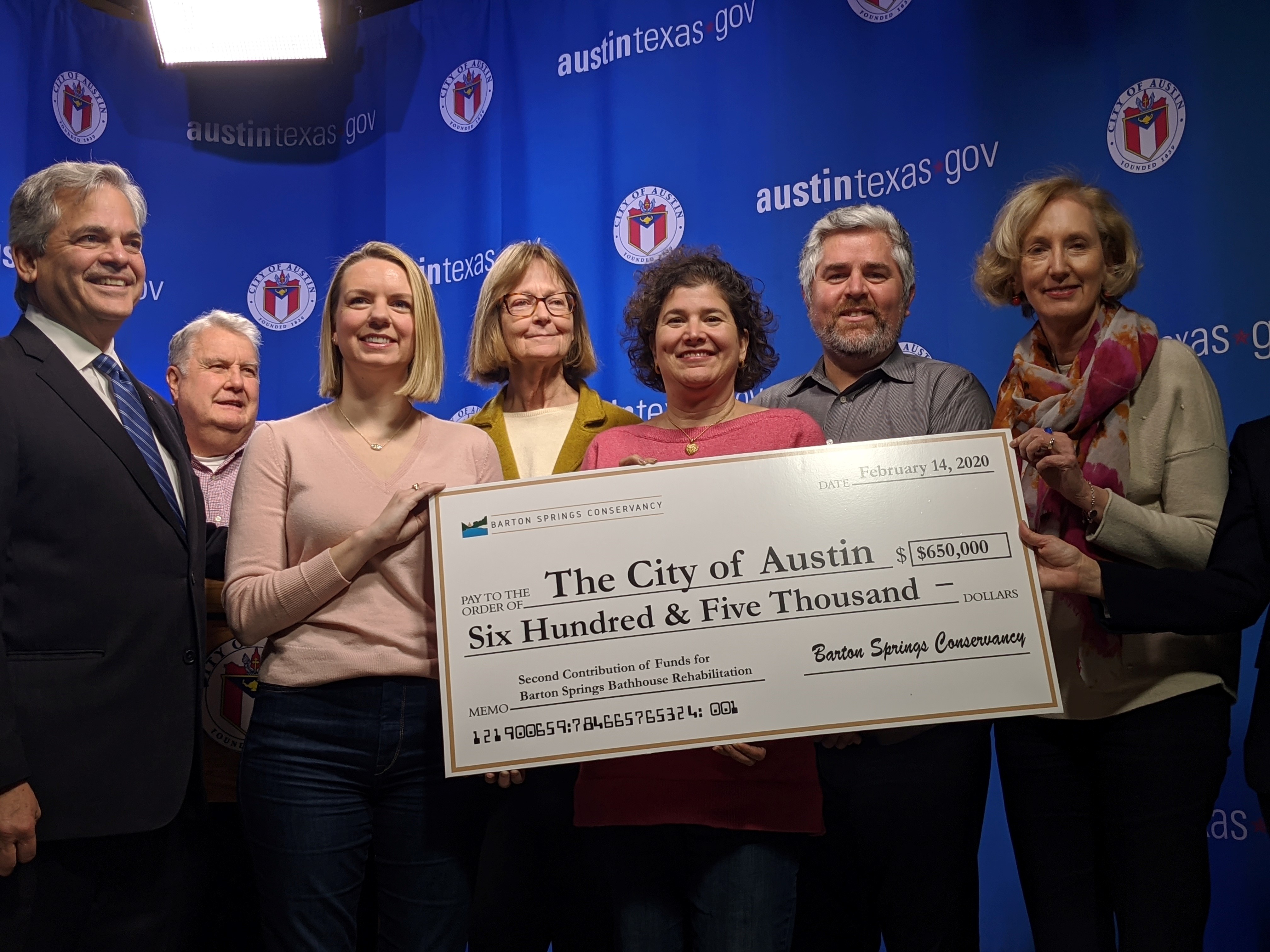 City Council members receiving check from the Austin Parks Foundation