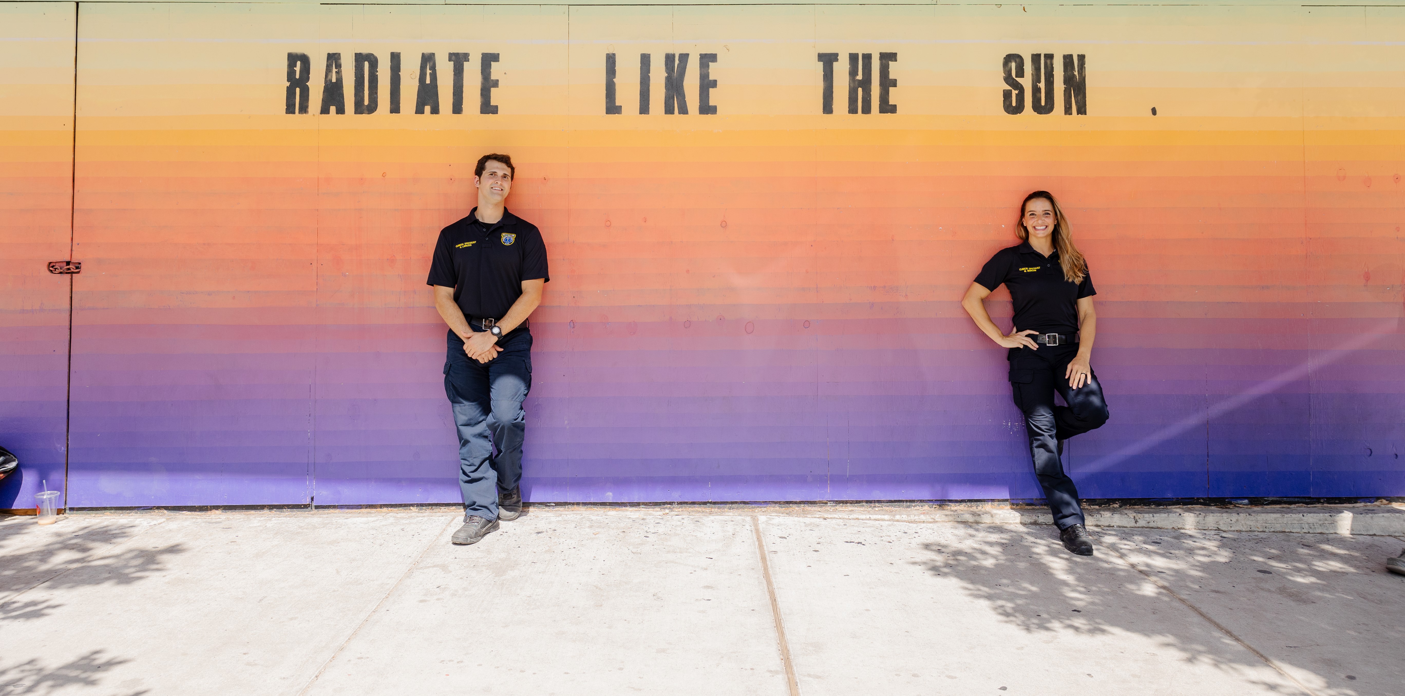 medics in front of mural