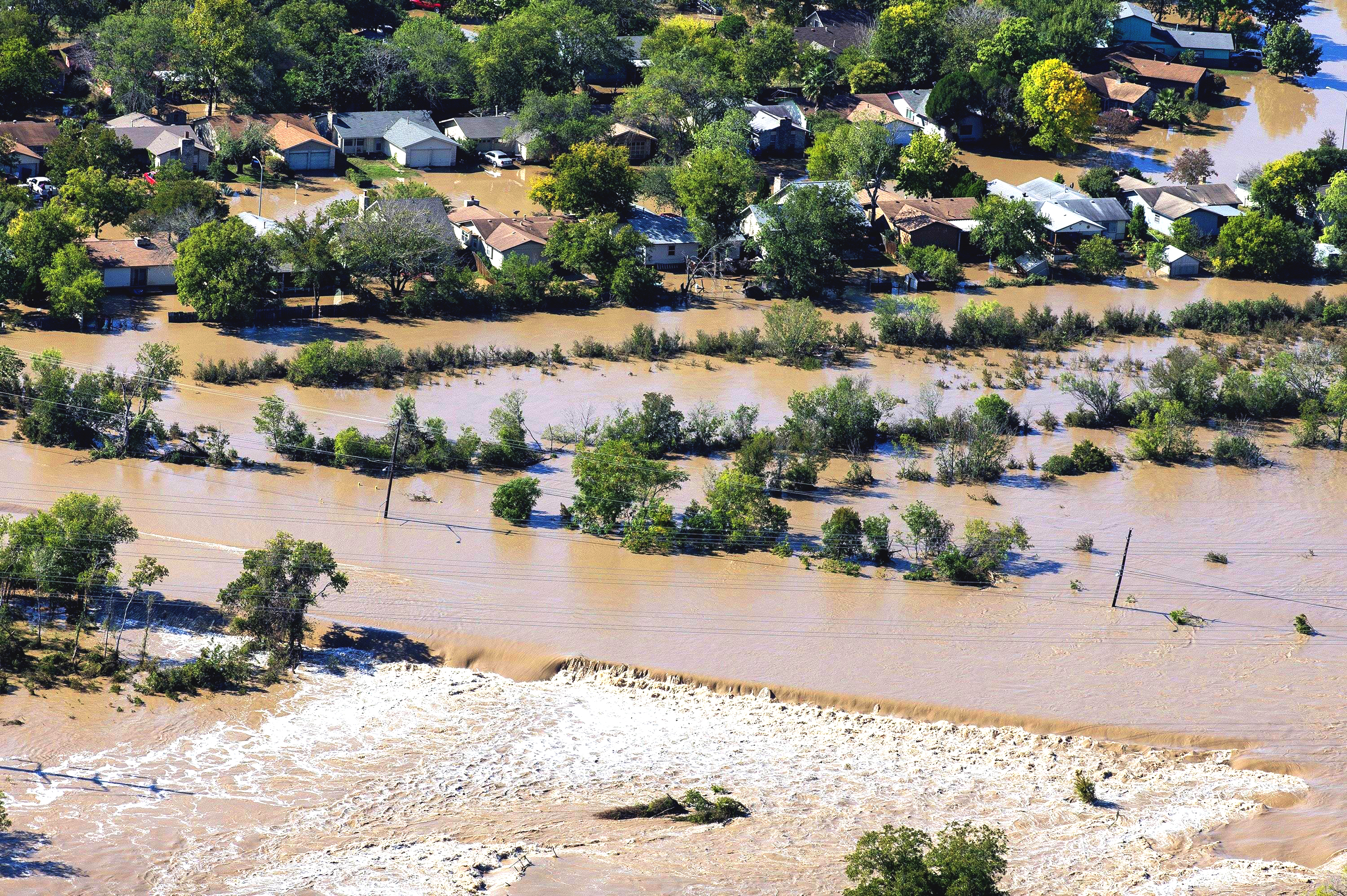 Water flowing over William Cannon Drive in 2013. Photo credit: Austin Police Department. 