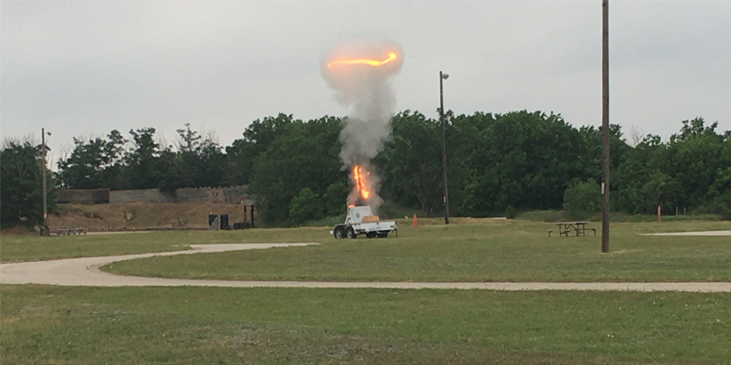 A photo showing a controlled explosion for demonstration purposes.