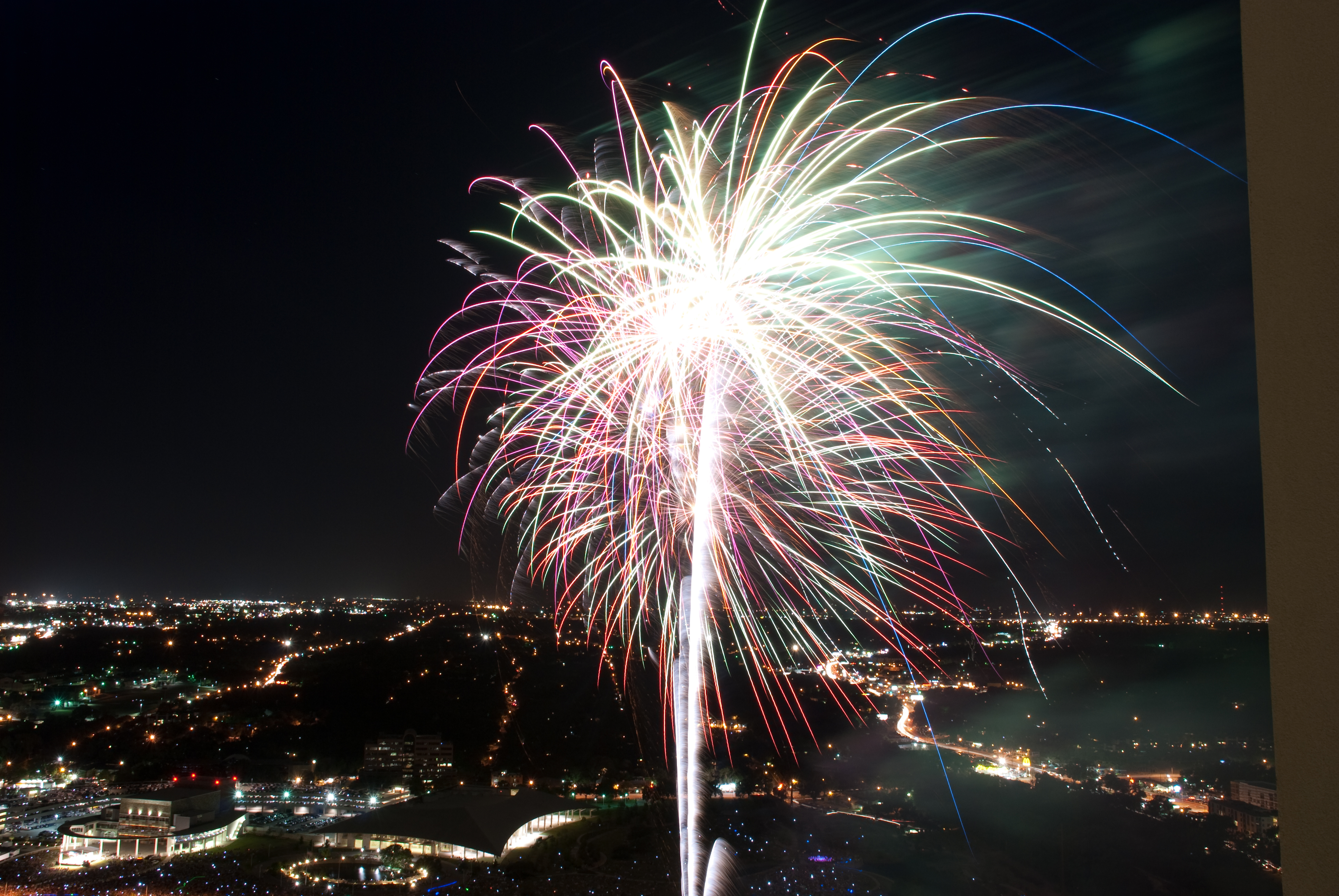 Fireworks bursting above city. Image of fireworks bursting above city.