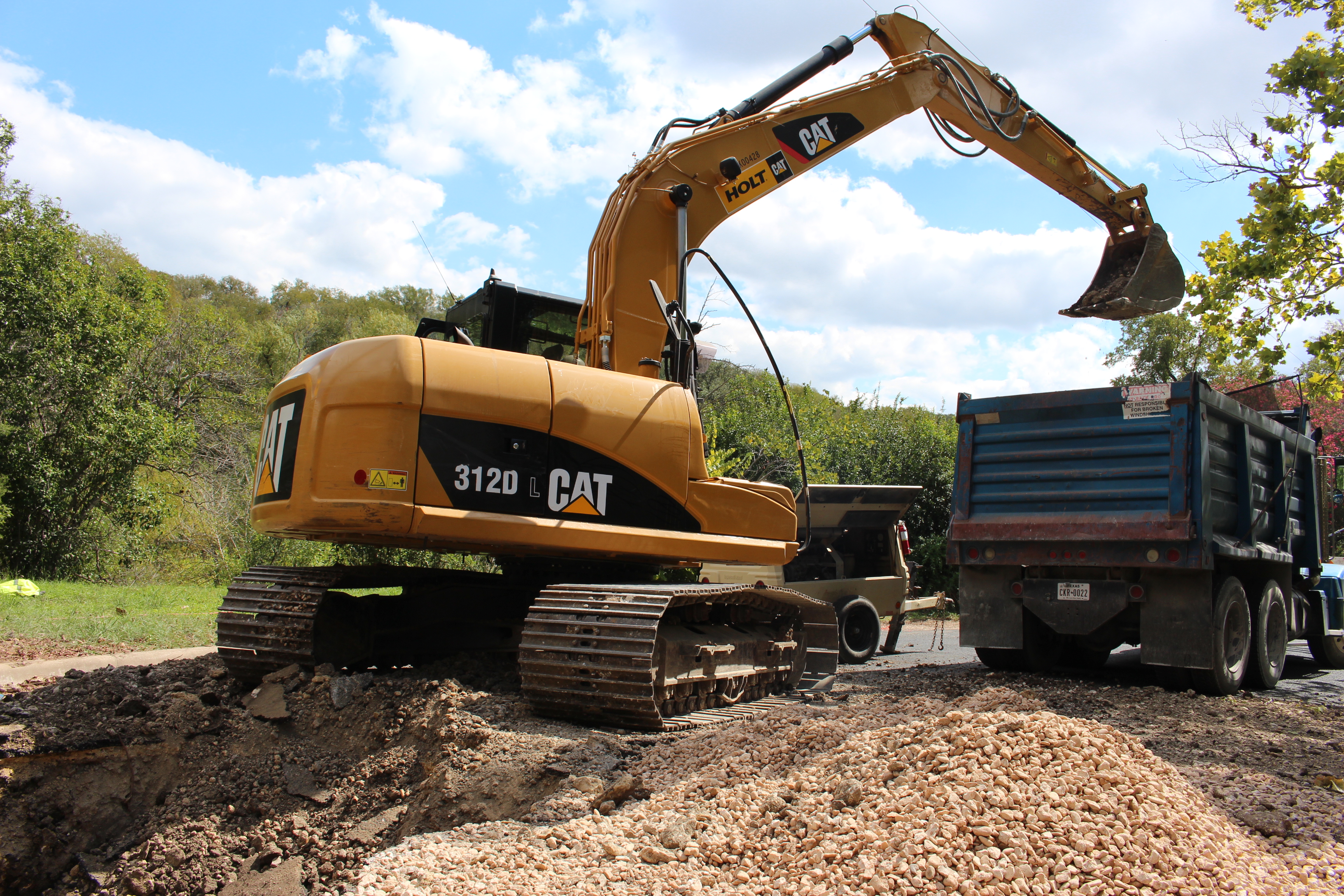 Field crews excavating