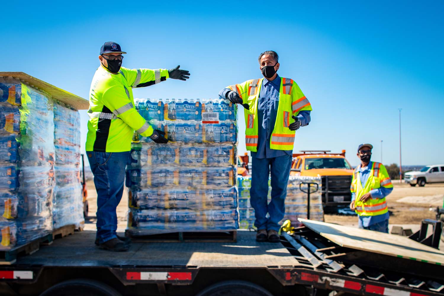 City employees helping to distribute bottled water during Feb 2021 winter storm