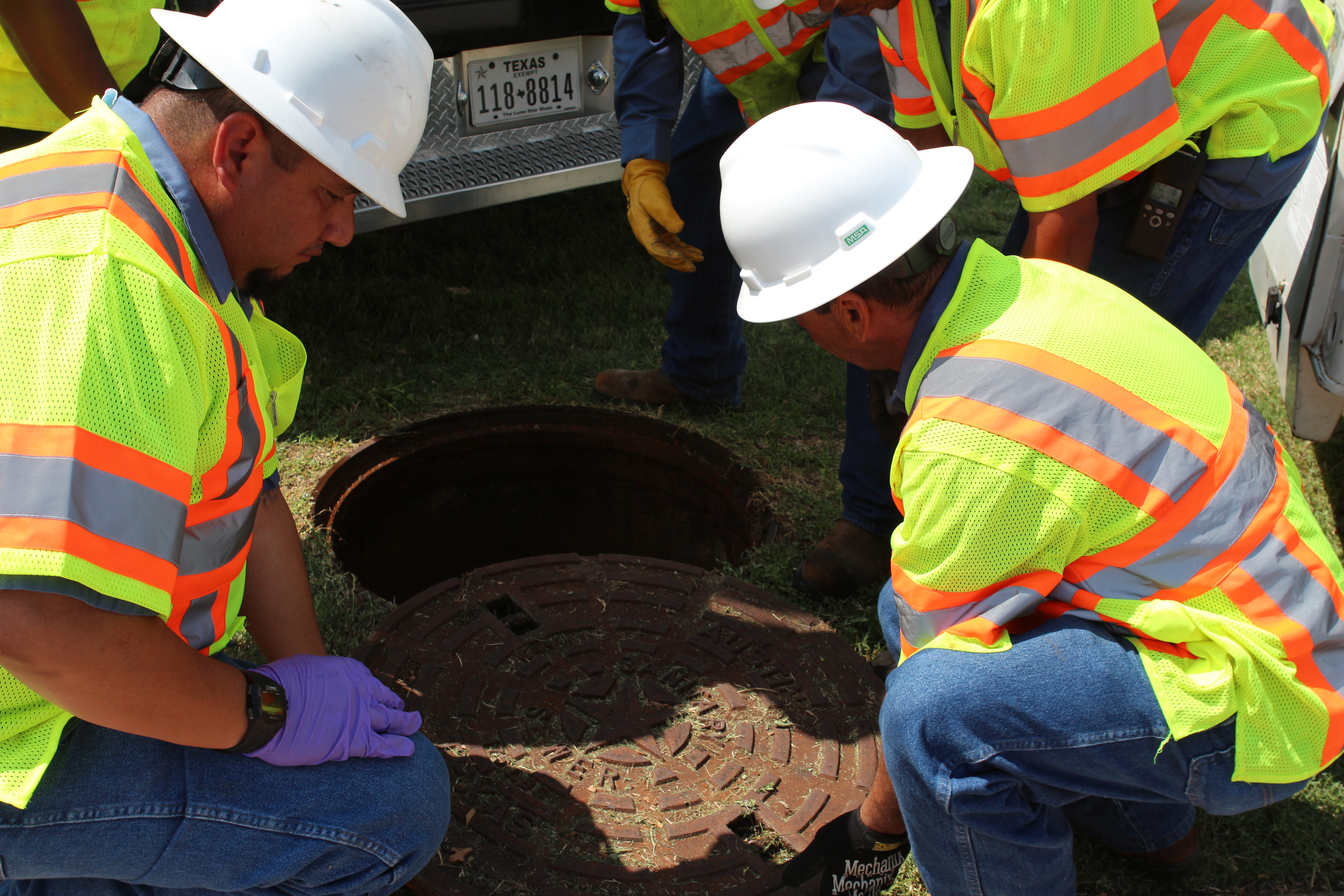 Crews Conducting Sewer System Work