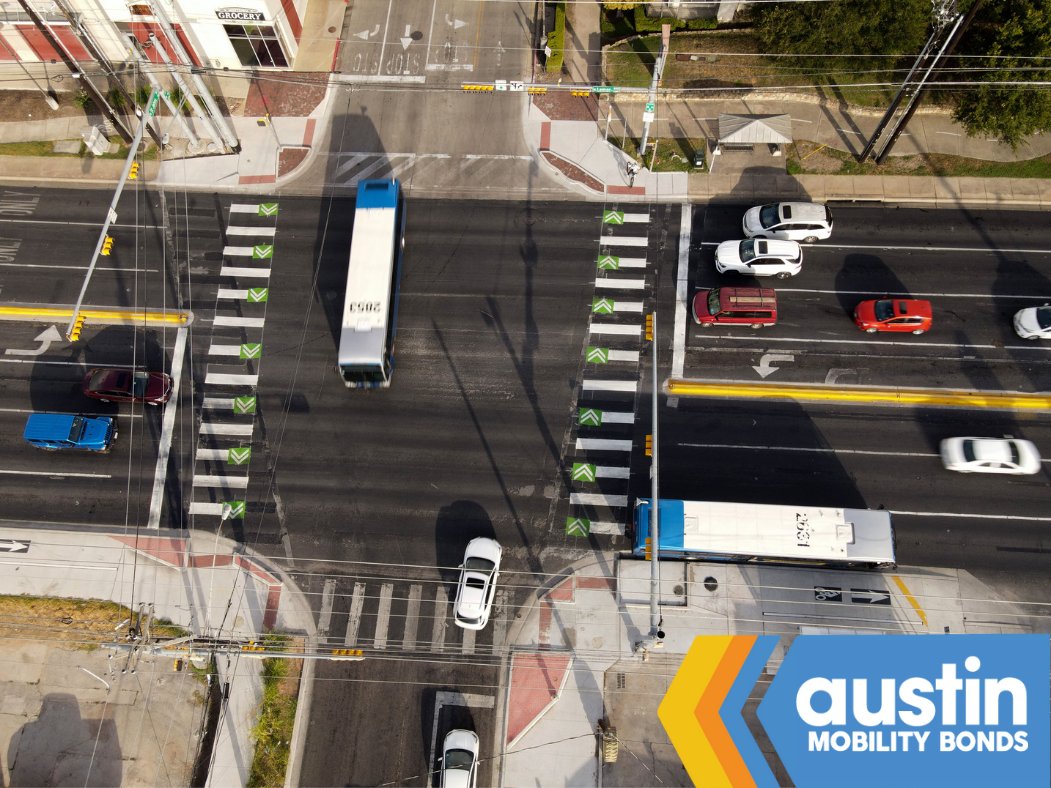 Buses and vehicles traverse Lamar Blvd. at St. Johns Ave. after implementation of intersection improvements.