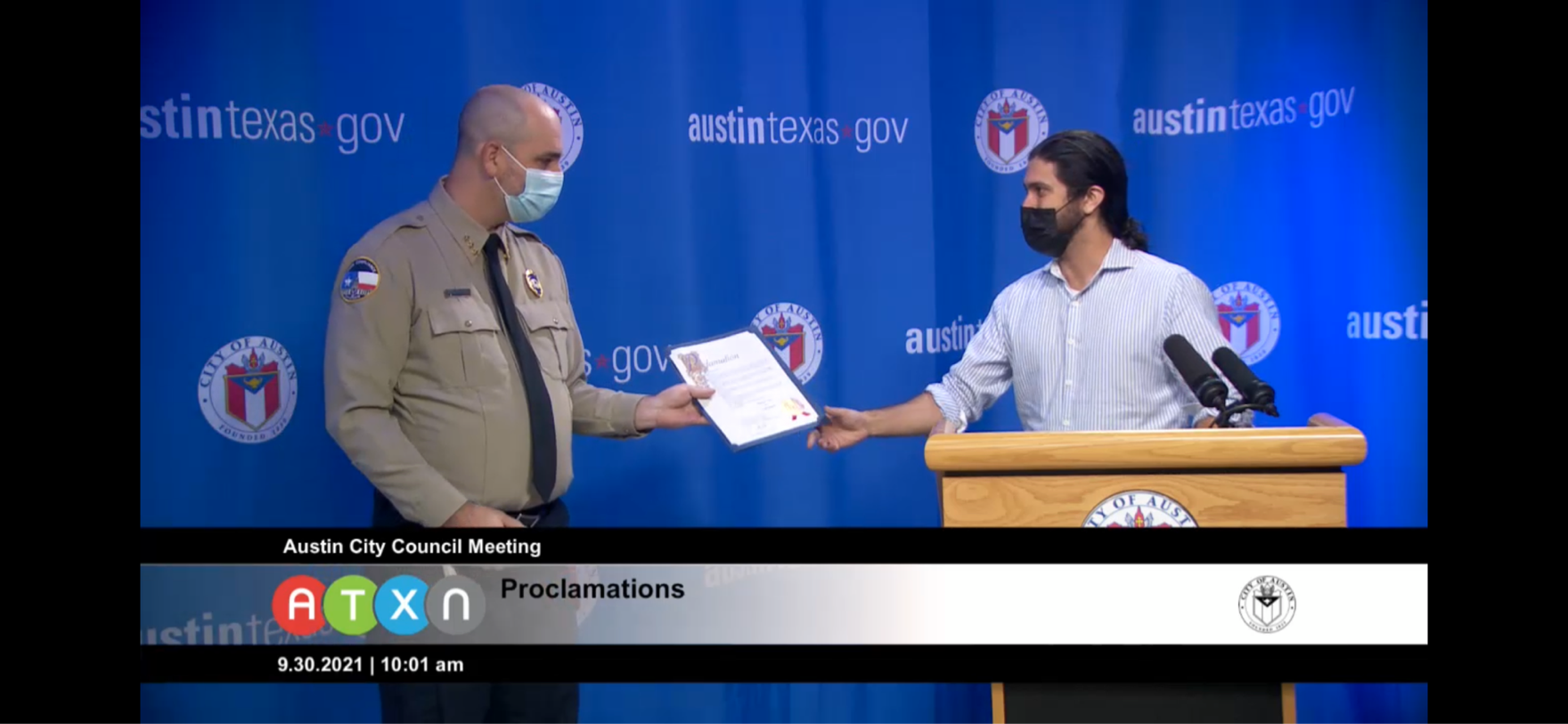 Assistant Director Daniel Word accepts the Proclamation of October as National Code Compliance Month from City Council member Greg Casar. Screenshot from ATXN showing Assistant Director Daniel Word accepting the City's Proclamation of National Code Compliance Month beginning October 1.