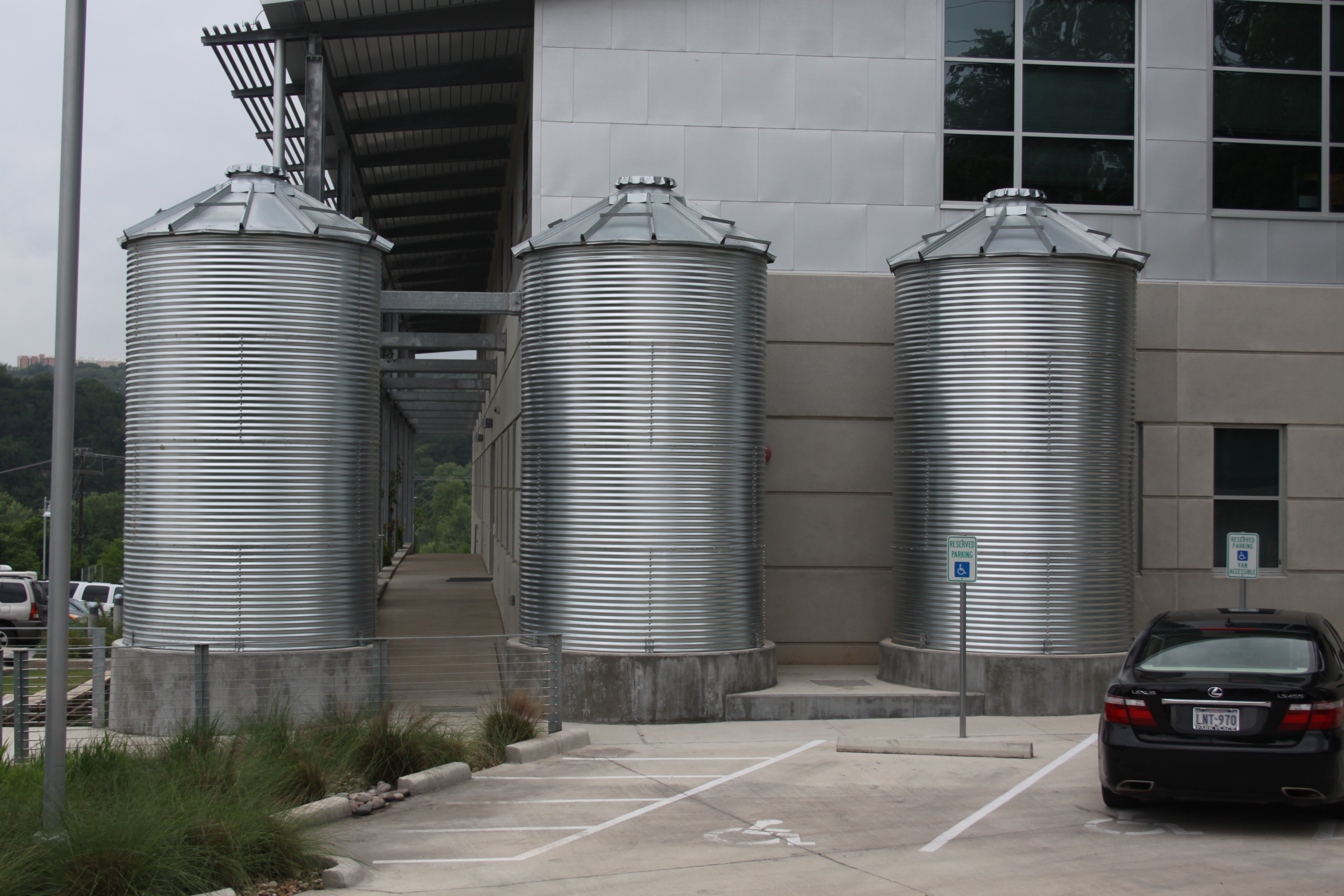Large rainwater harvesting tanks pictured.