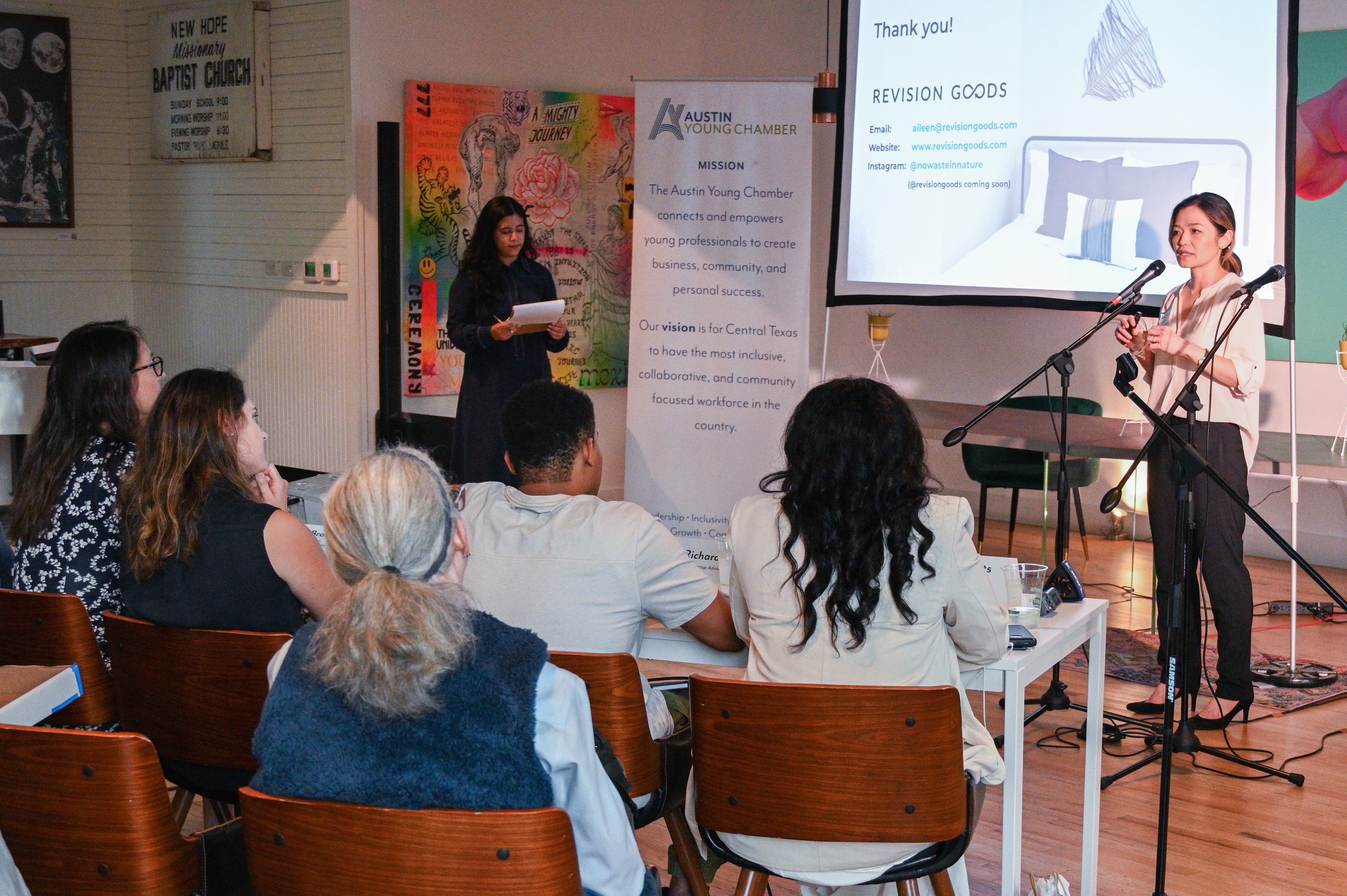 A women stands and presents to an audience at last year's Circular Austin Showcase.
