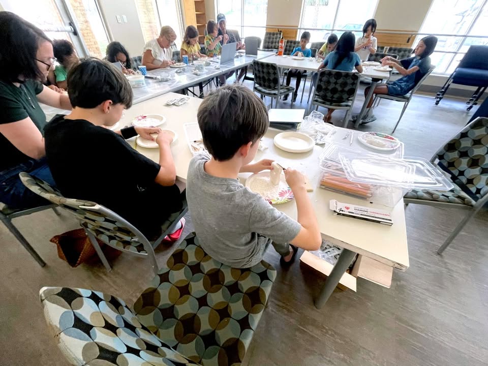 kids in a classroom crafting