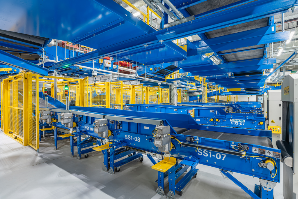 Photo showing baggage handling equipment as part of completed portion of Phase 1 of the new Outbound Baggage Handling System.