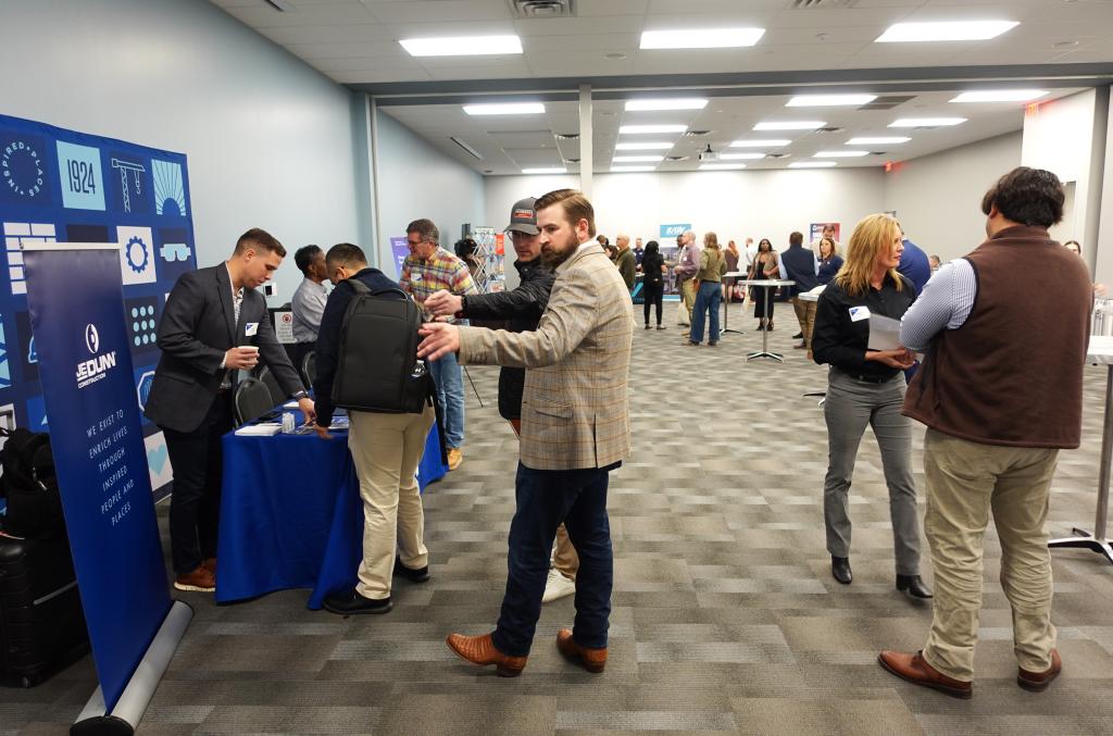 Attendees of the “Runway to Opportunities: Prime Contractor Meet and Greet” event mingle and hear about subcontracting opportunities for Austin-Bergstrom International Airport's Journey With AUS expansion program projects.