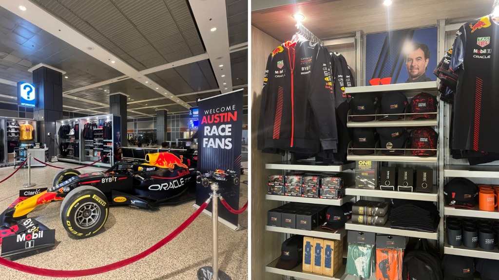 A picture of a red bull Formula 1 racecar and merchandise on display at the airport. 