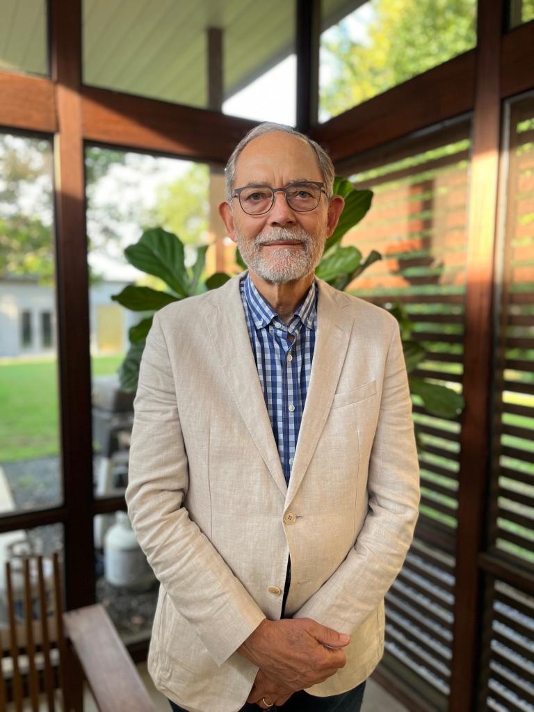 Chuck Naeve standing in his home for a personal photo of himself today. 