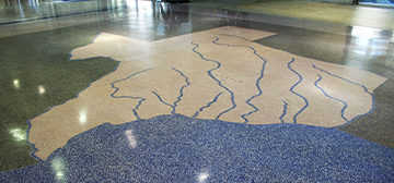 Terrazzo floor displaying a map of the state of Texas and it's rivers