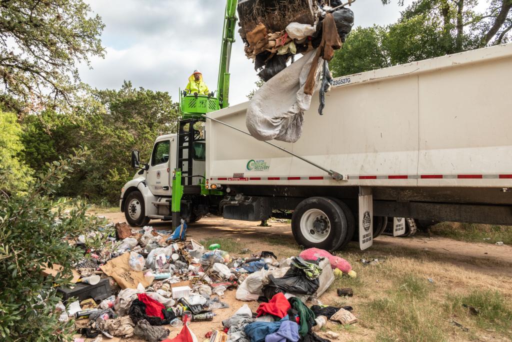 Cleanup begins at Gaines Creek Greenbelt closed encampment near Violet Crown Trail