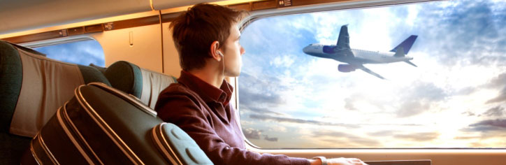 Photo of traveler on plane seeing plane out window
