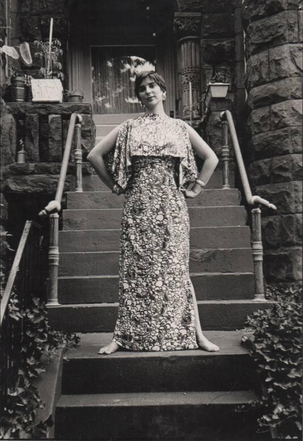 Jean Houlihan modeling dress on steps