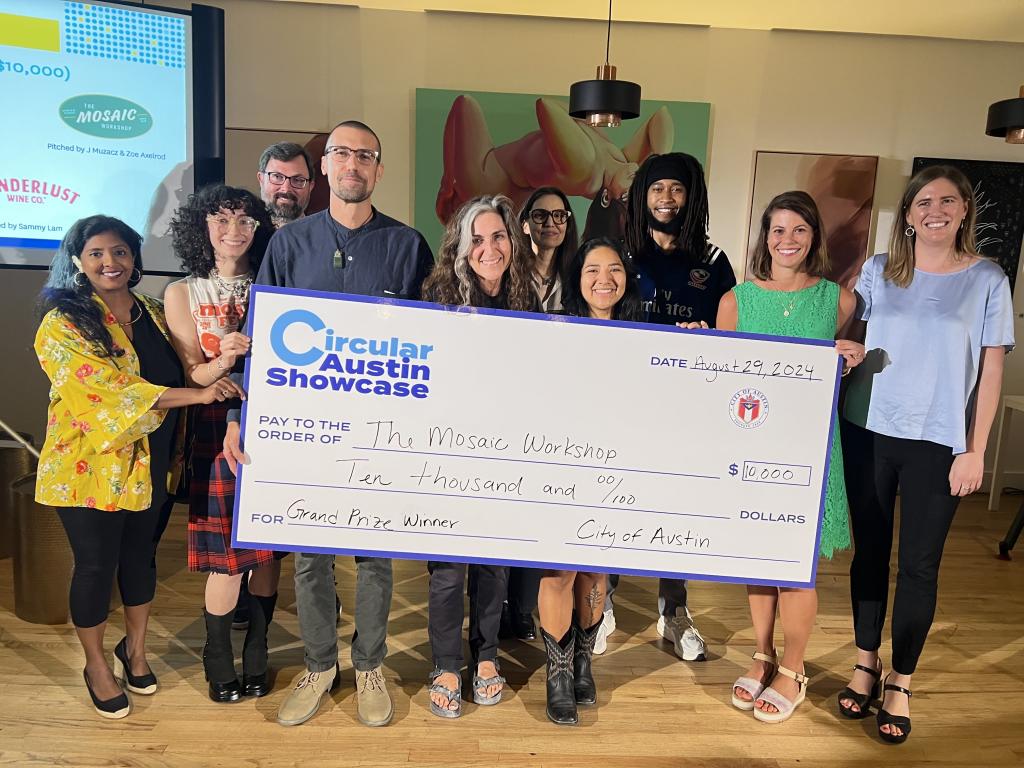 The Mosaic Workshop accepts the $10,000 prize from Maddie Morgan and the judging panel at the 2024 Circular Austin Showcase.
