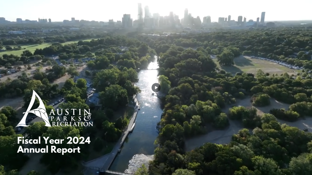 Cover of the FY24 Annual Report website featuring a drone photo of Barton Springs with the City in the background. 