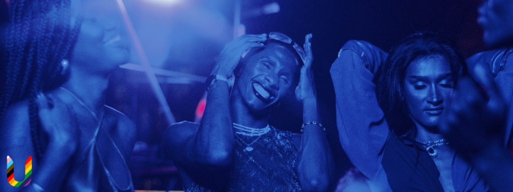 People dancing in blue light