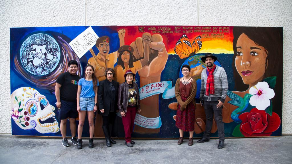 Caminos mural, caminantes posing with Dolores Huerta 
