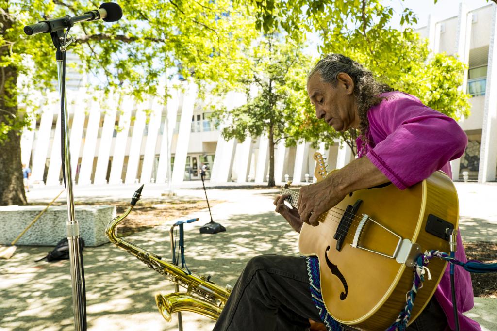Photograph of musician Daniel Llanes performing on the MACC Zocalo 