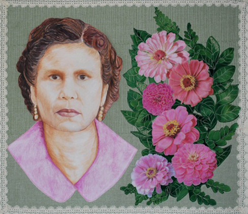 Mary Ann Vaca-Lambert's art quilt "Green Card Garden" was inspired by her grandmother's green card. On the left side is face of Mary Ann's grandmother. On the right are pink zinnias her grandmother grew in her garden. The green background and the vertical quilting replicate the texture of her house, green card, and her garden. The lace boarder is made by lace that was once owned by her grandmother.