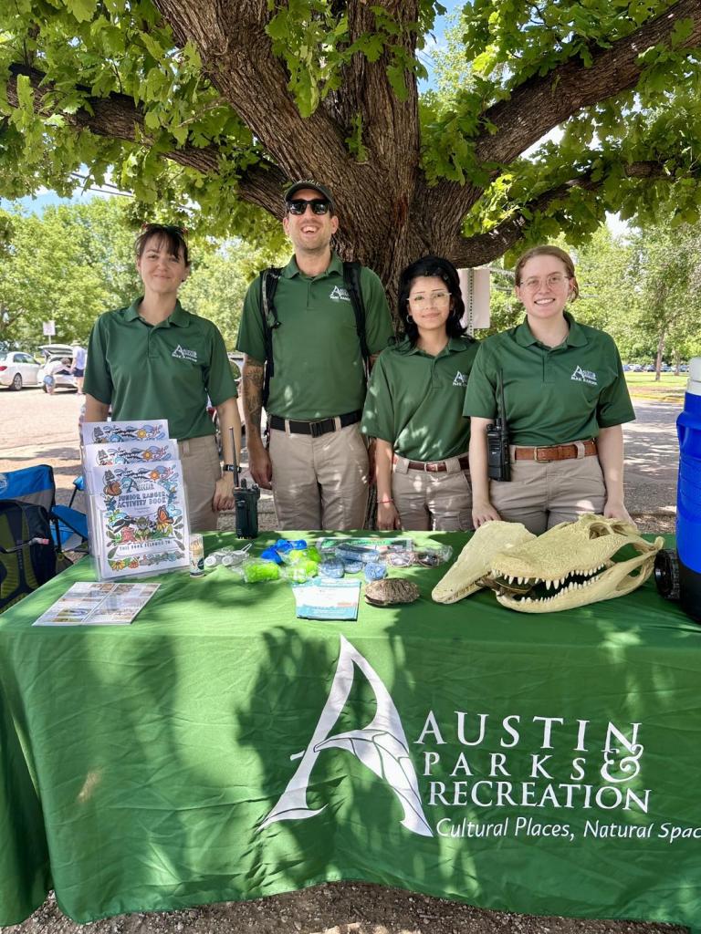 Four Temporary Rangers together under a tree in the park