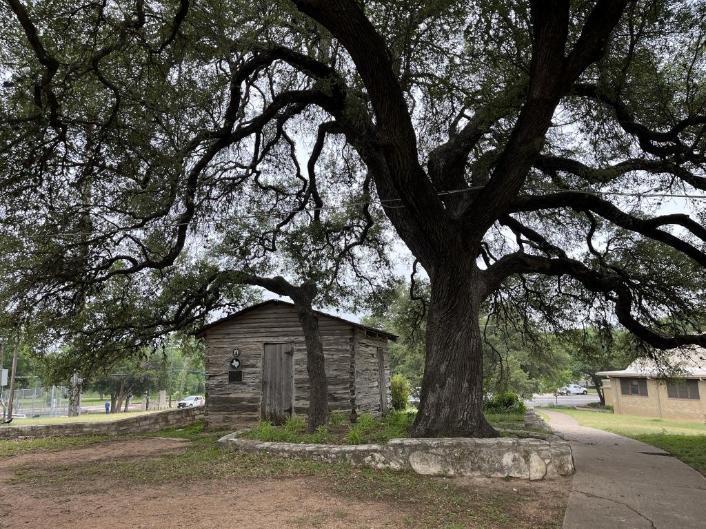 Photo of the Madison Cabin, a highly significant structure within historic Rosewood Park. Photo courtesy of Austin Parks and Recreation Dept.