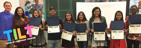  seven teens holding Leadership Awards upon TILT completion  