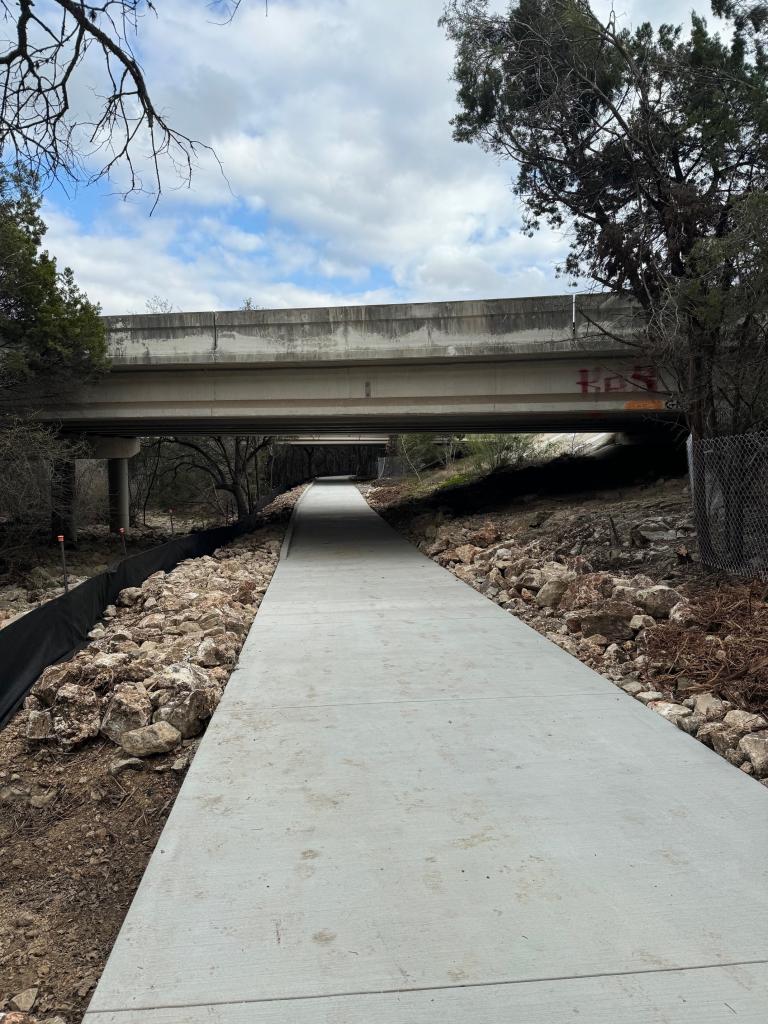 Concrete trail under MoPac Right of Way